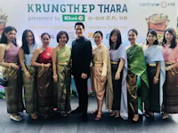 a group of people posing for a photo in thailand