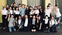 a group of people posing for a photo
