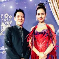 a man and a woman standing next to each other